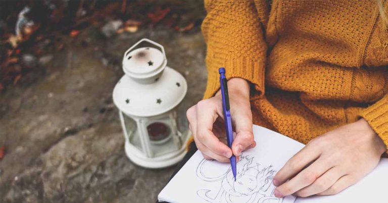 A woman sitting and drawing