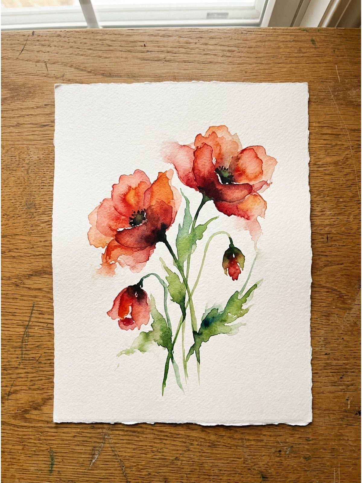 Loose watercolor painting of poppies on cold press watercolor paper