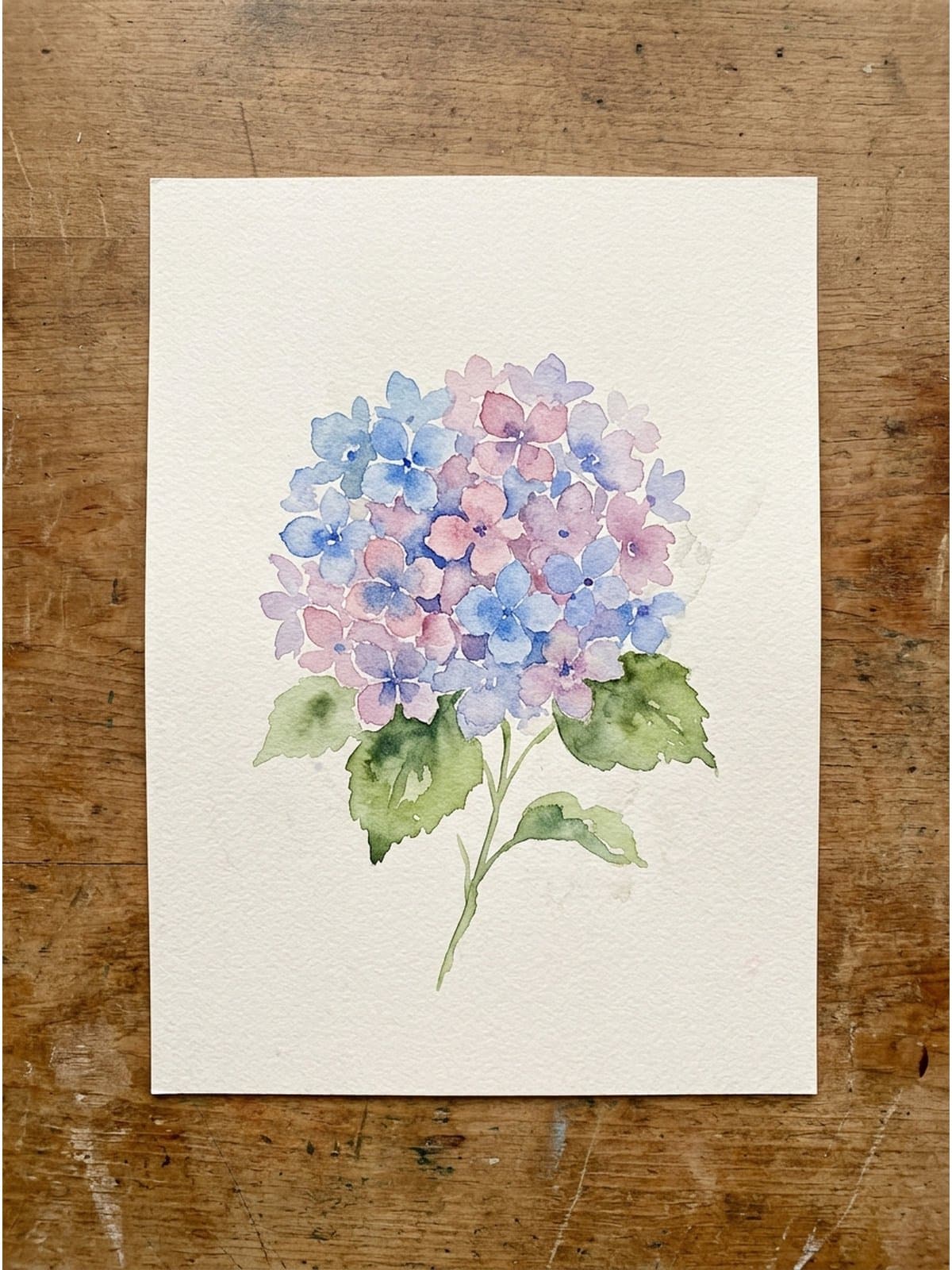Loose watercolor painting of hydrangeas on cold press watercolor paper