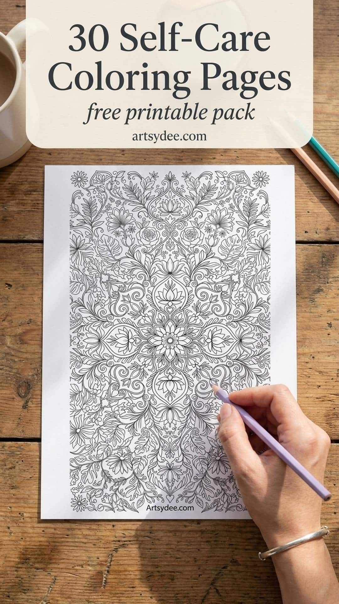 30 self-care coloring pages for adults - free printable pack - hand colouring a printed floral coloring page with a lavender pencil