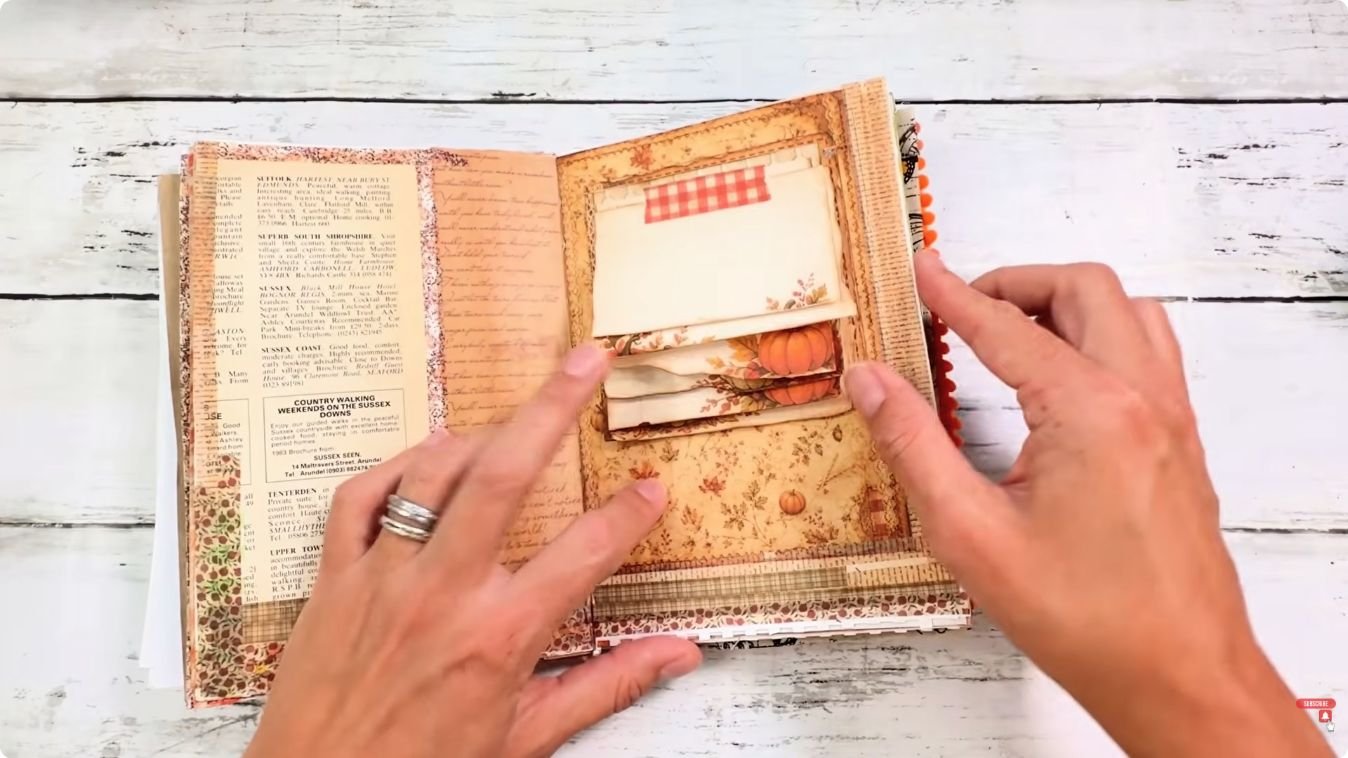 Hands flipping through a torn mini notepad attached with gingham washi tape