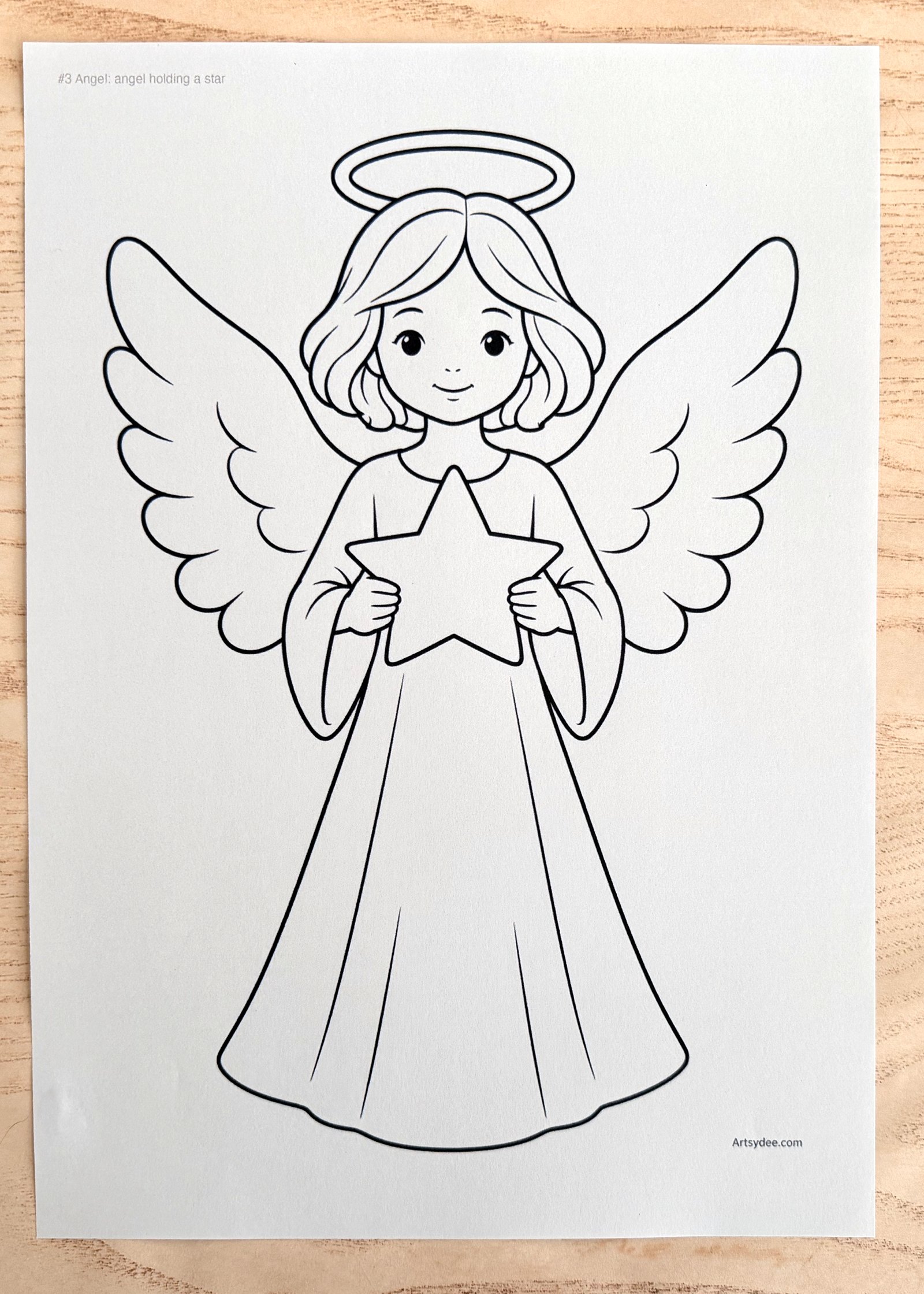 The free Angel Templates printed on paper and photographed on Dee's desk at Artsydee
